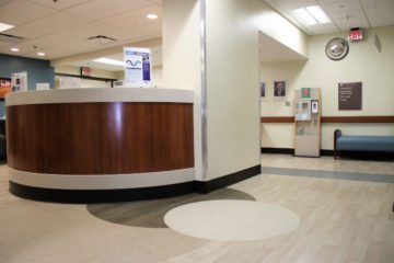 United States Department of Veterans Affairs NIHCS Fort Wayne Campus front desk flooring installation project by INSTALL